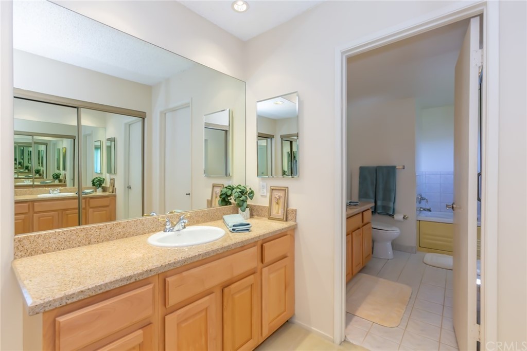 25610 Fallenleaf Drive Torrance, CA 90505 - Photo 31 of 49 a bathroom with a sink a toilet and mirror