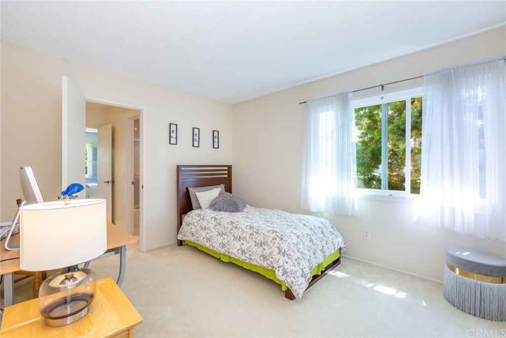 25610 Fallenleaf Drive Torrance, CA 90505 - Photo 34 of 49 a bedroom with a bed and wooden floor