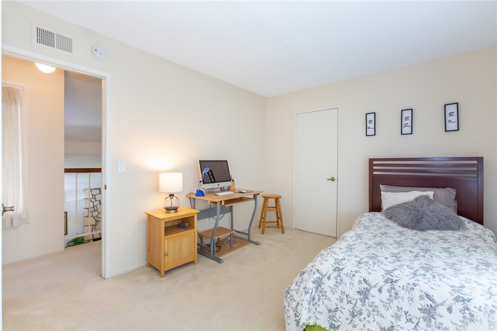 25610 Fallenleaf Drive Torrance, CA 90505 - Photo 36 of 49 a bedroom with a bed and a table in it