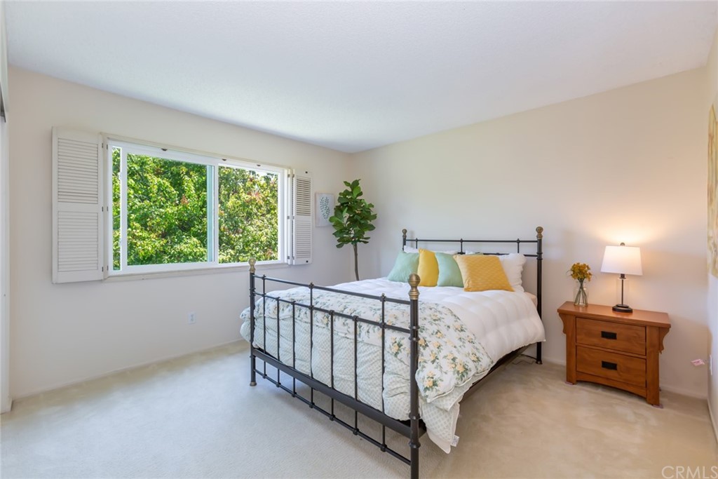 25610 Fallenleaf Drive Torrance, CA 90505 - Photo 38 of 49 a bed room with a bed and a chair