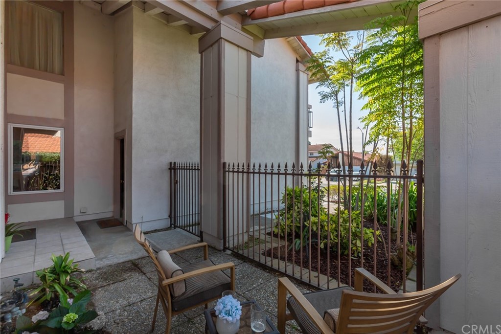 25610 Fallenleaf Drive Torrance, CA 90505 - Photo 5 of 49 a view of a porch with a floor to ceiling window and garden