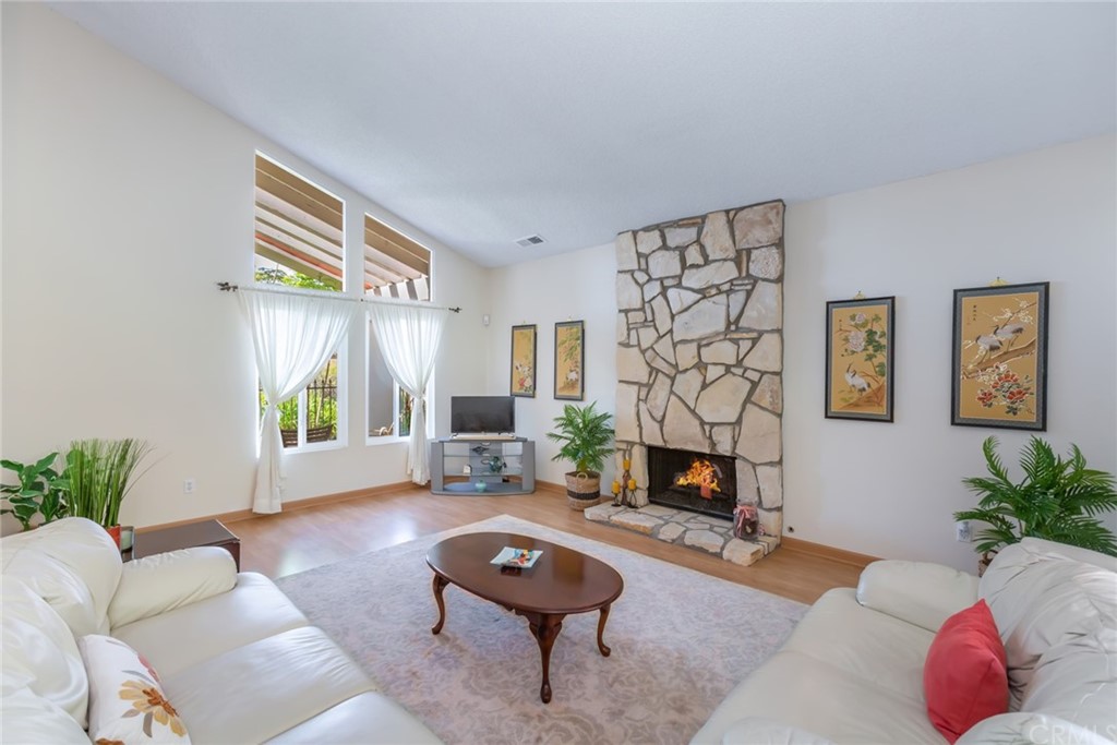 25610 Fallenleaf Drive Torrance, CA 90505 - Photo 10 of 49 a living room with furniture and a fireplace