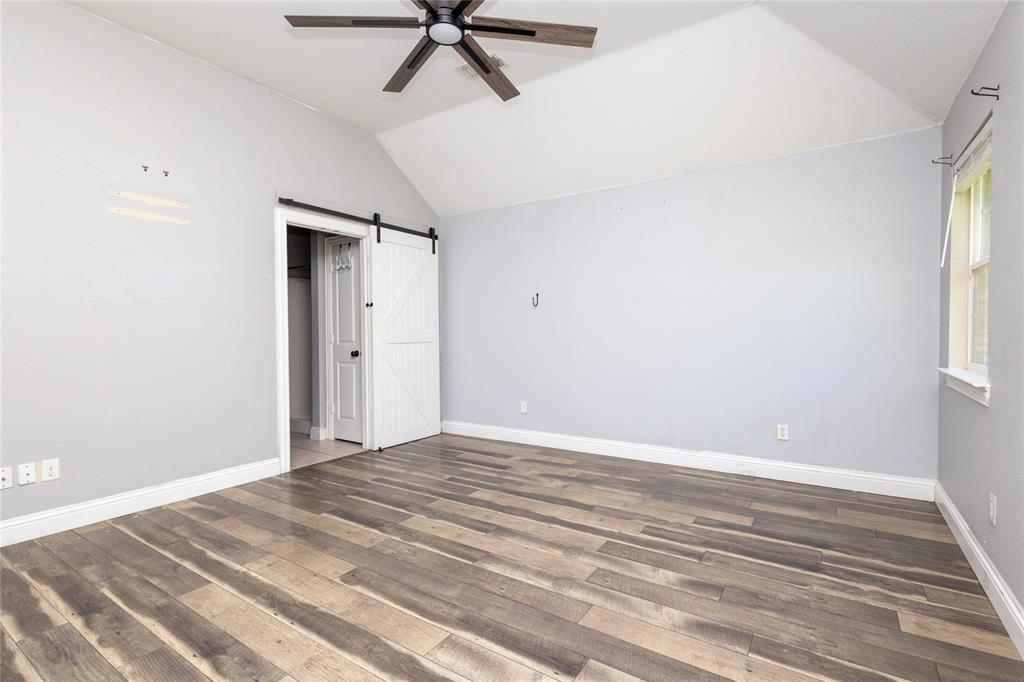 512 Milton Road Josephine, TX 75173 - Photo 16 of 31 a view of a room with a ceiling fan and window