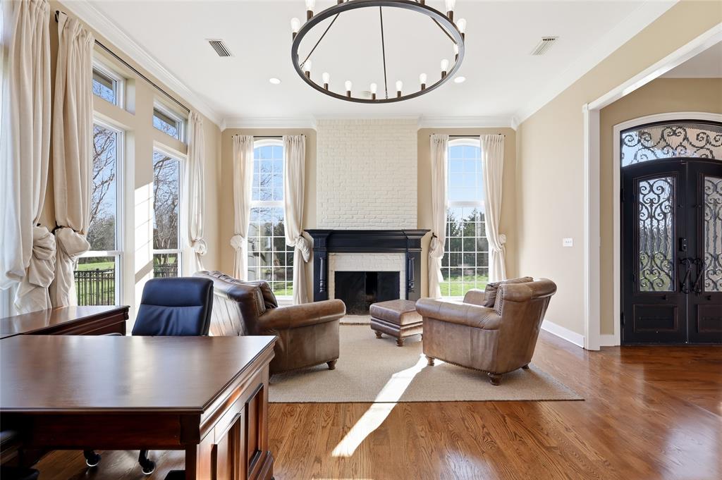 243 South King Road Heath, TX 75126 - Photo 11 of 40 a living room with furniture a table and a large window