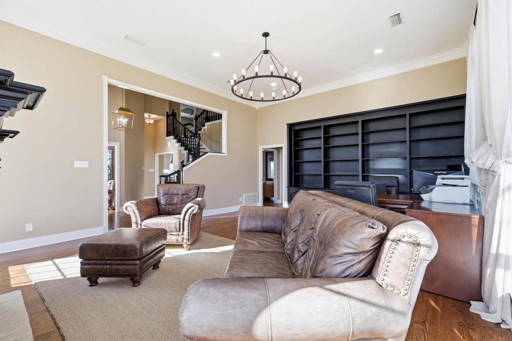 243 South King Road Heath, TX 75126 - Photo 12 of 40 a living room with furniture a ceiling fan and a window