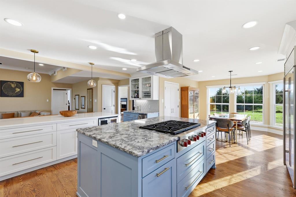 243 South King Road Heath, TX 75126 - Photo 17 of 40 a kitchen with sink stove and cabinets