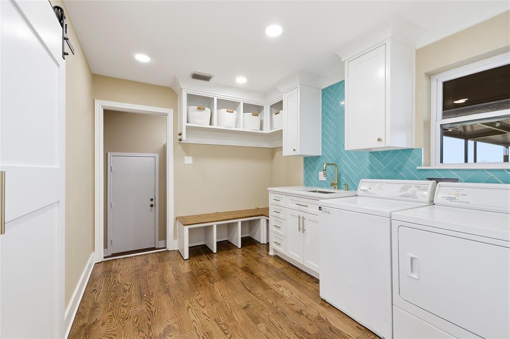 243 South King Road Heath, TX 75126 - Photo 19 of 40 a room with dryer and washer