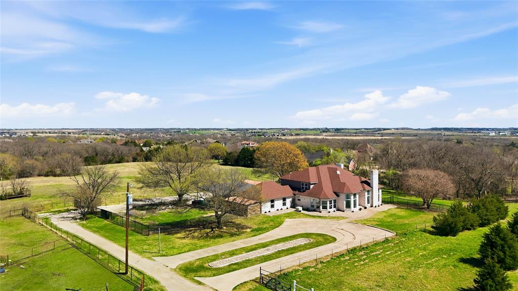 243 South King Road Heath, TX 75126 - Photo 3 of 40 a view of a city with lawn chairs