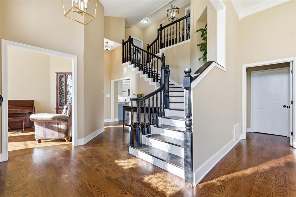 243 South King Road Heath, TX 75126 - Photo 7 of 40 a view of entryway and hall with wooden floor