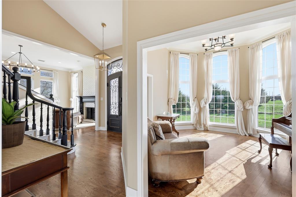243 South King Road Heath, TX 75126 - Photo 9 of 40 a living room with furniture and a large window