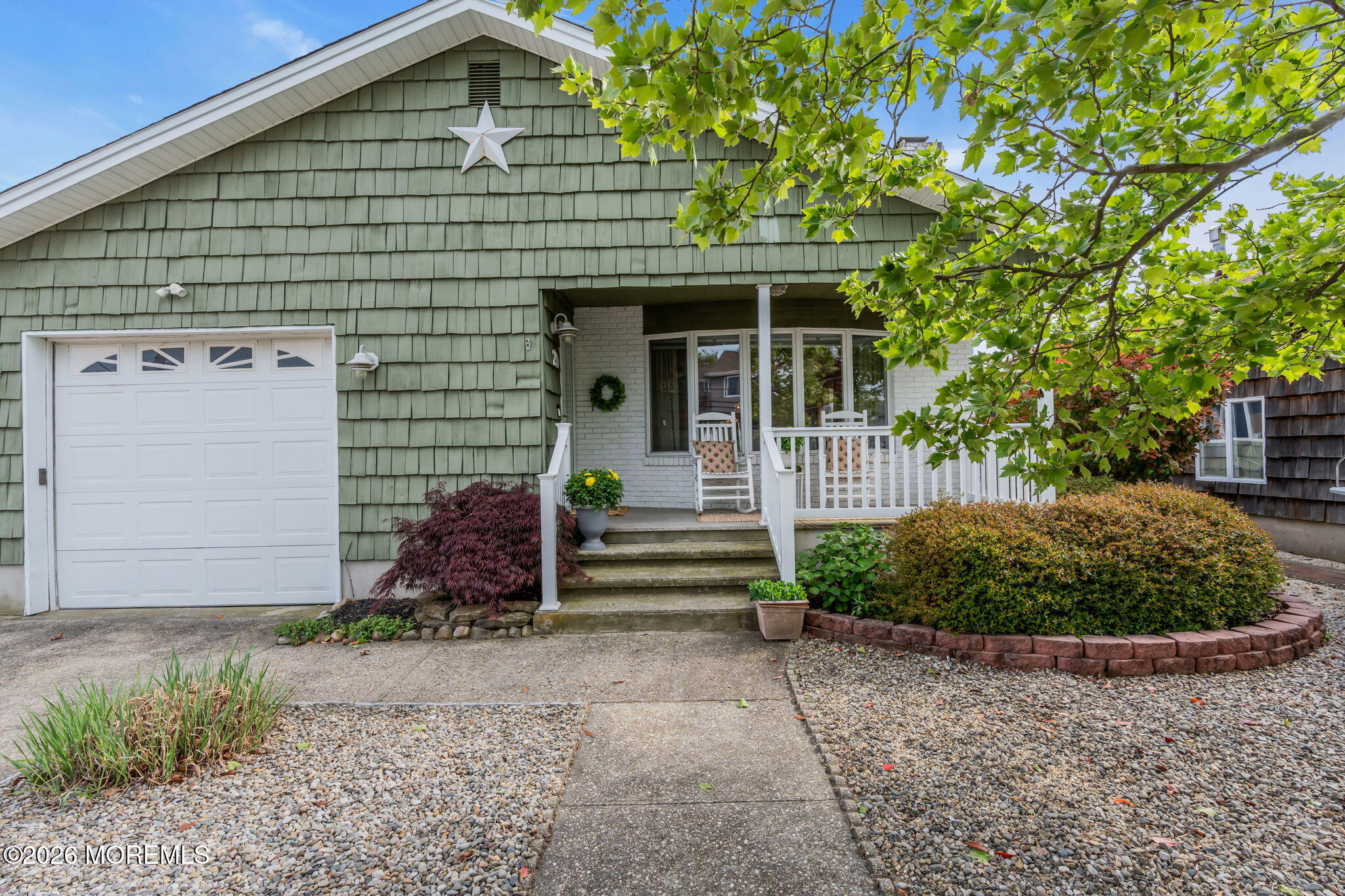 29 Green Island Road Toms River, NJ 08753 - Photo 2 of 63 a front view of a house with garden