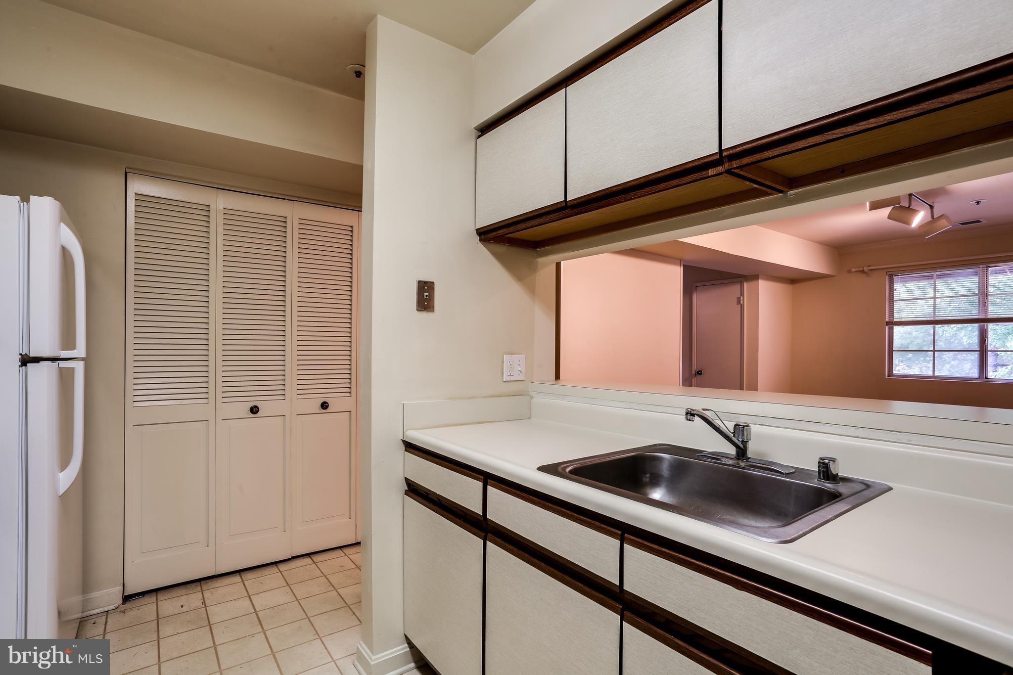 4954 Columbia Road, Unit 55 Columbia, MD 21044 - Photo 11 of 27 Kitchen with newer refrigerator