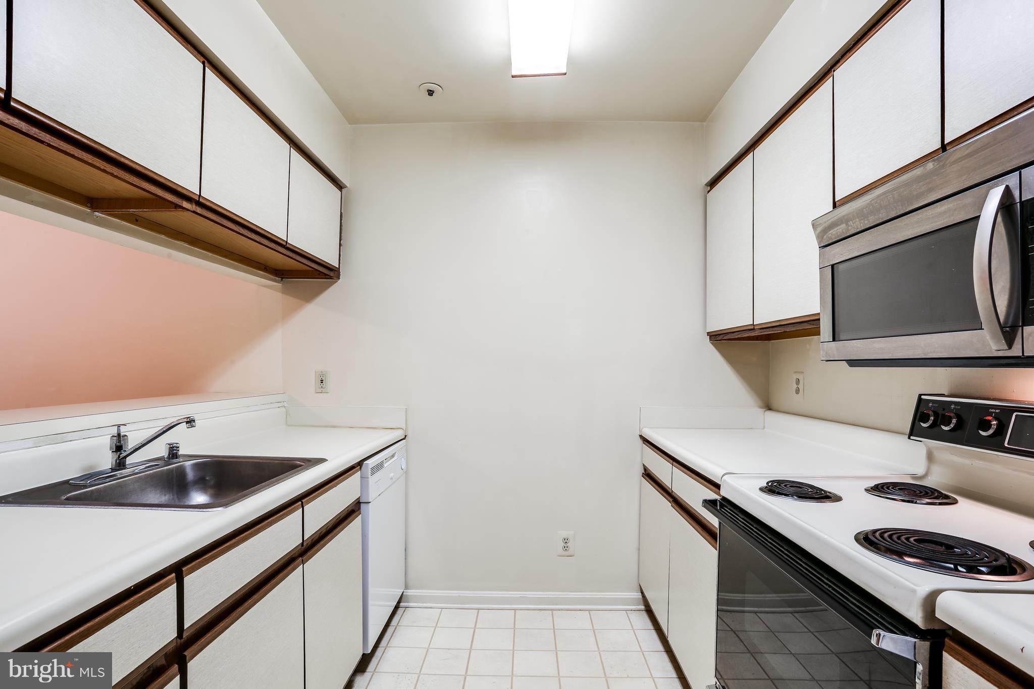 4954 Columbia Road, Unit 55 Columbia, MD 21044 - Photo 12 of 27 Kitchen with plenty of cabinet space