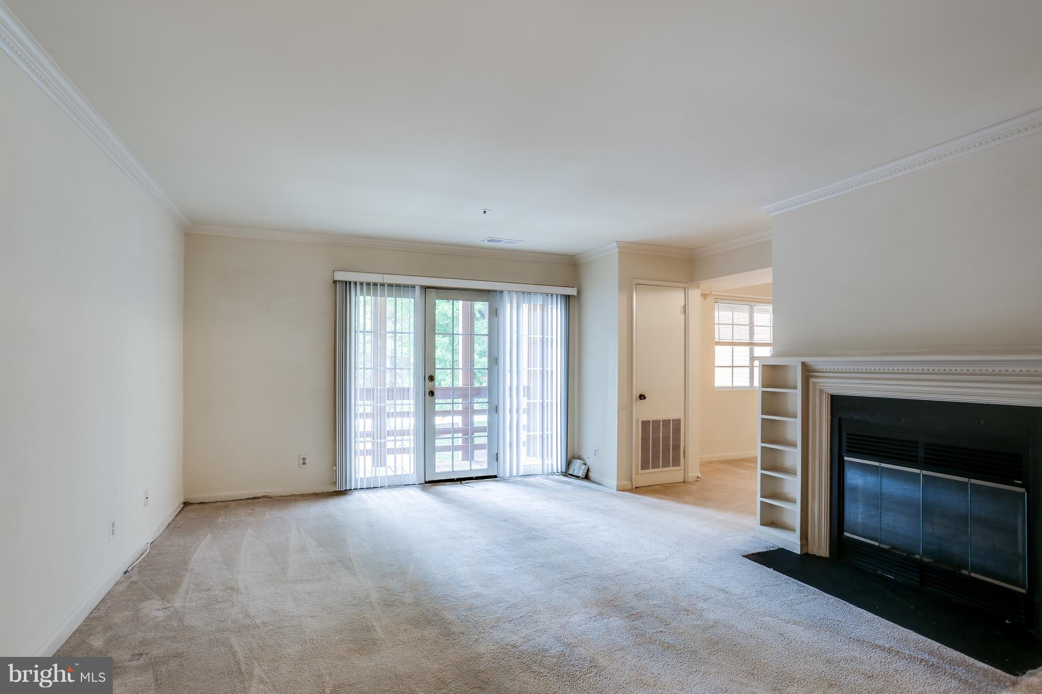 4954 Columbia Road, Unit 55 Columbia, MD 21044 - Photo 6 of 27 Living Room with French door leading to balcony