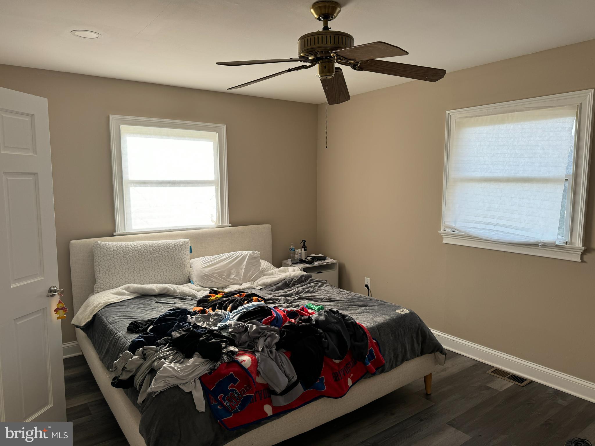 2006 A Avenue Atco, NJ 08004 - Photo 8 of 14 a bedroom with a bed and wooden floor