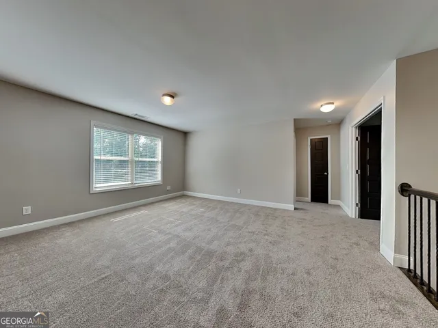 wooden floor and closet in a room