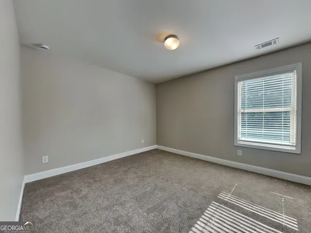 a bathroom with a sink a mirror and a bathtub