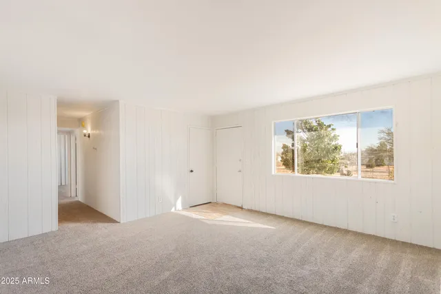 an empty room with windows