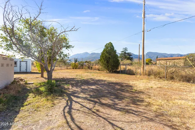 a view of large house with a yard