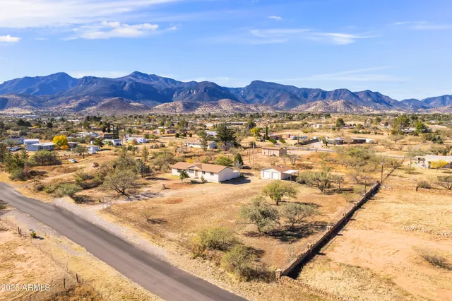 a view of an ocean and a mountain