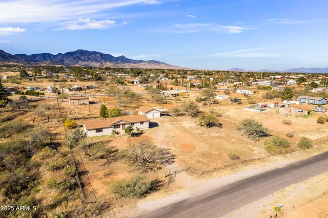 a view of an ocean and a mountain