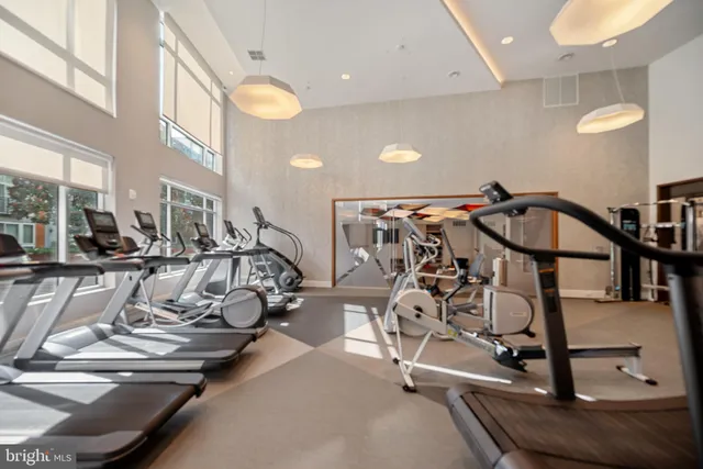 a large white kitchen with lots of counter space