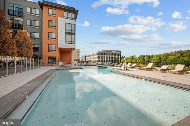 a view of balcony with furniture