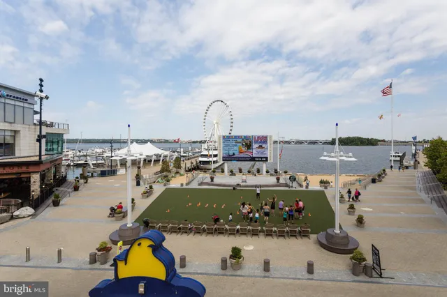 a view of a swimming pool with a seating space