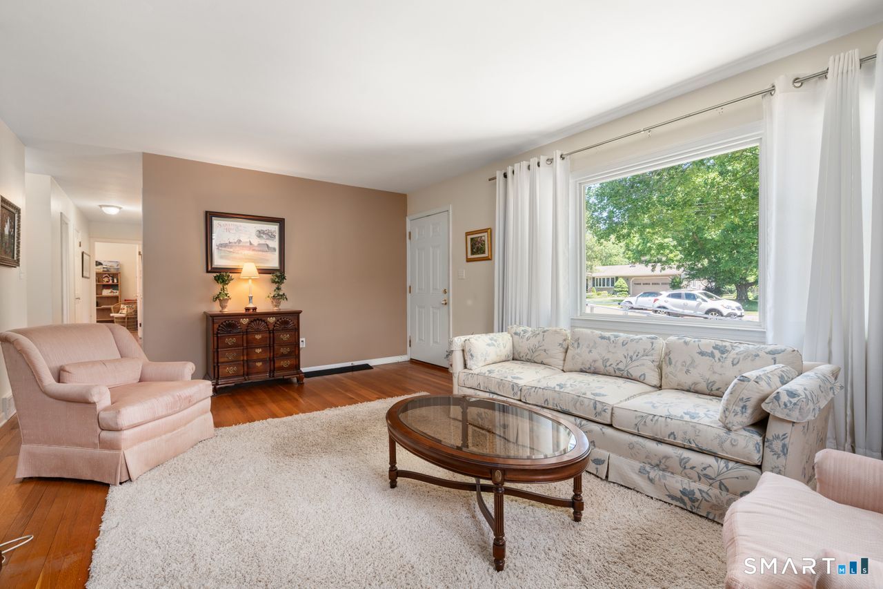 9 Stanton Road North Haven, CT 06473 - Photo 4 of 35 a living room with furniture and a large window