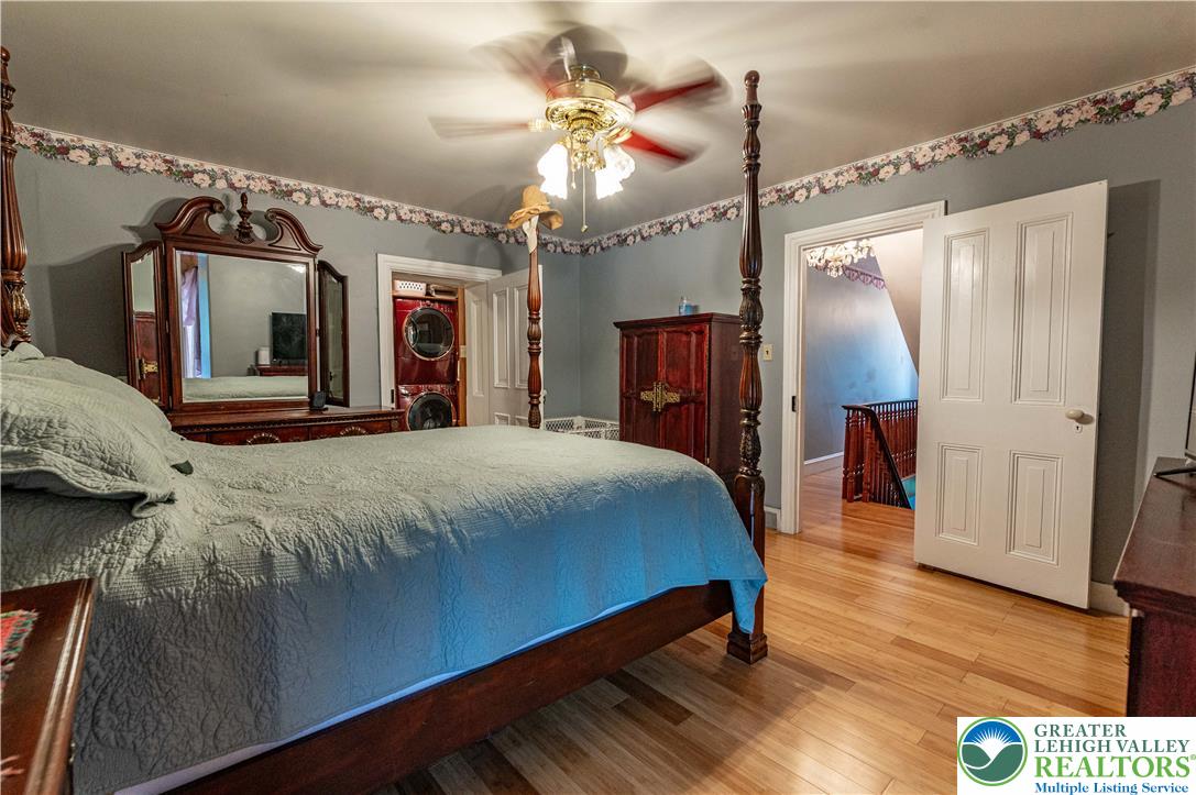 2485 Hieter Road Quakertown, PA 18951 - Photo 27 of 97 Hardwood floors and a ceiling fan create a comfortable atmosphere in this well-appointed bedroom.