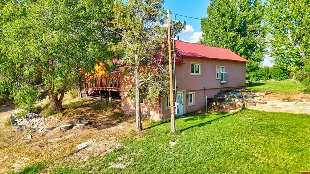 a house with yard in front of it