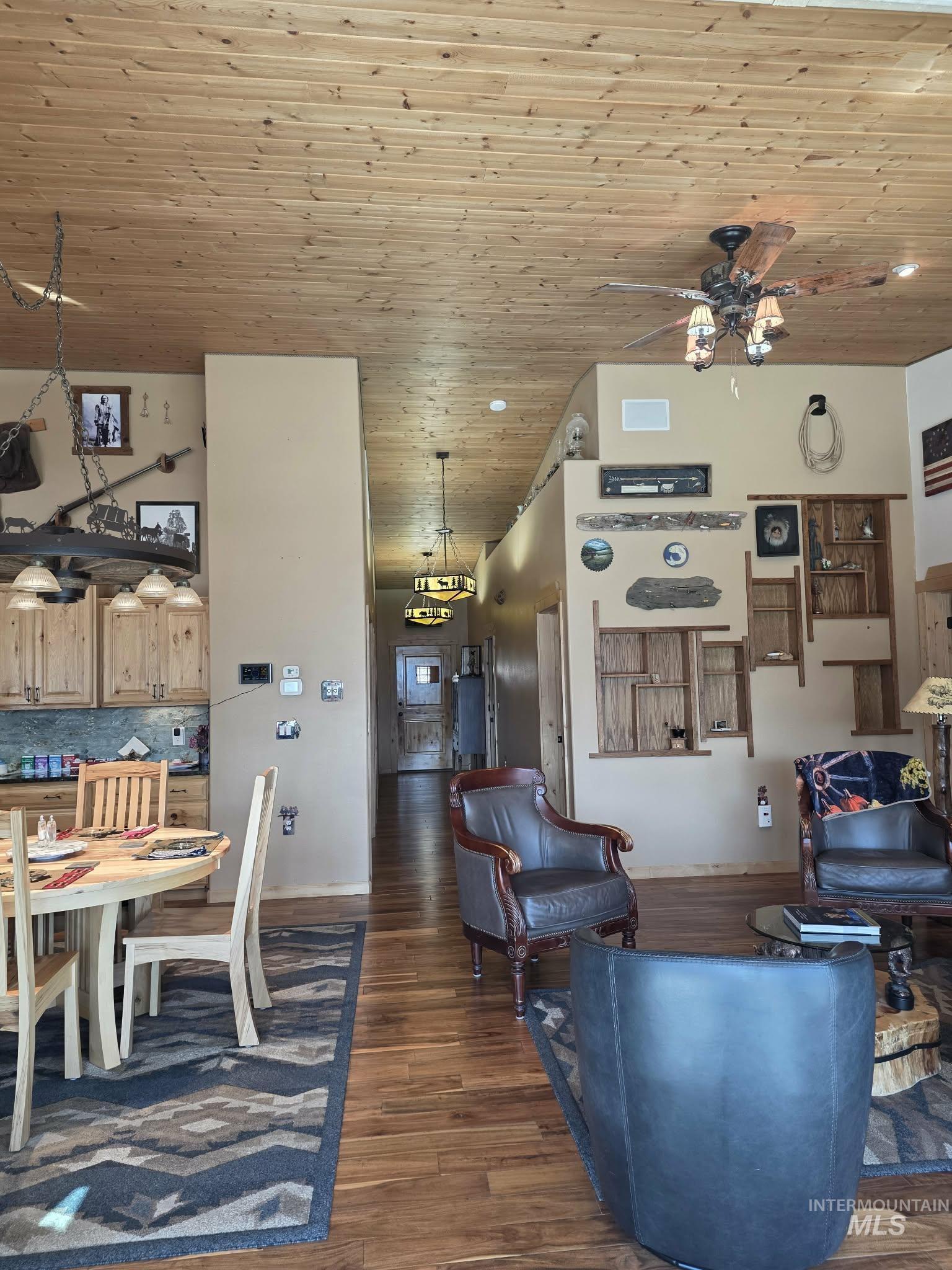 809 River Pointe Lane Lenore, ID 83541 - Photo 11 of 43 Living area with a high wooden ceiling, dark wood-style floors, ceiling fan, and recessed lighting