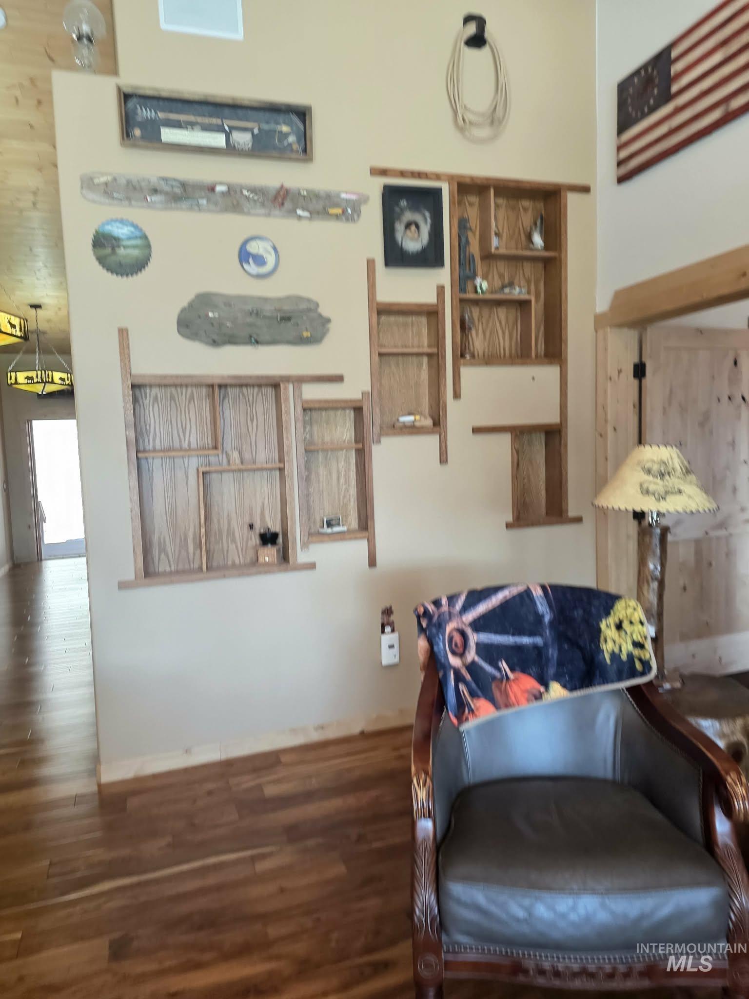 809 River Pointe Lane Lenore, ID 83541 - Photo 12 of 43 Living area with wood finished floors and baseboards