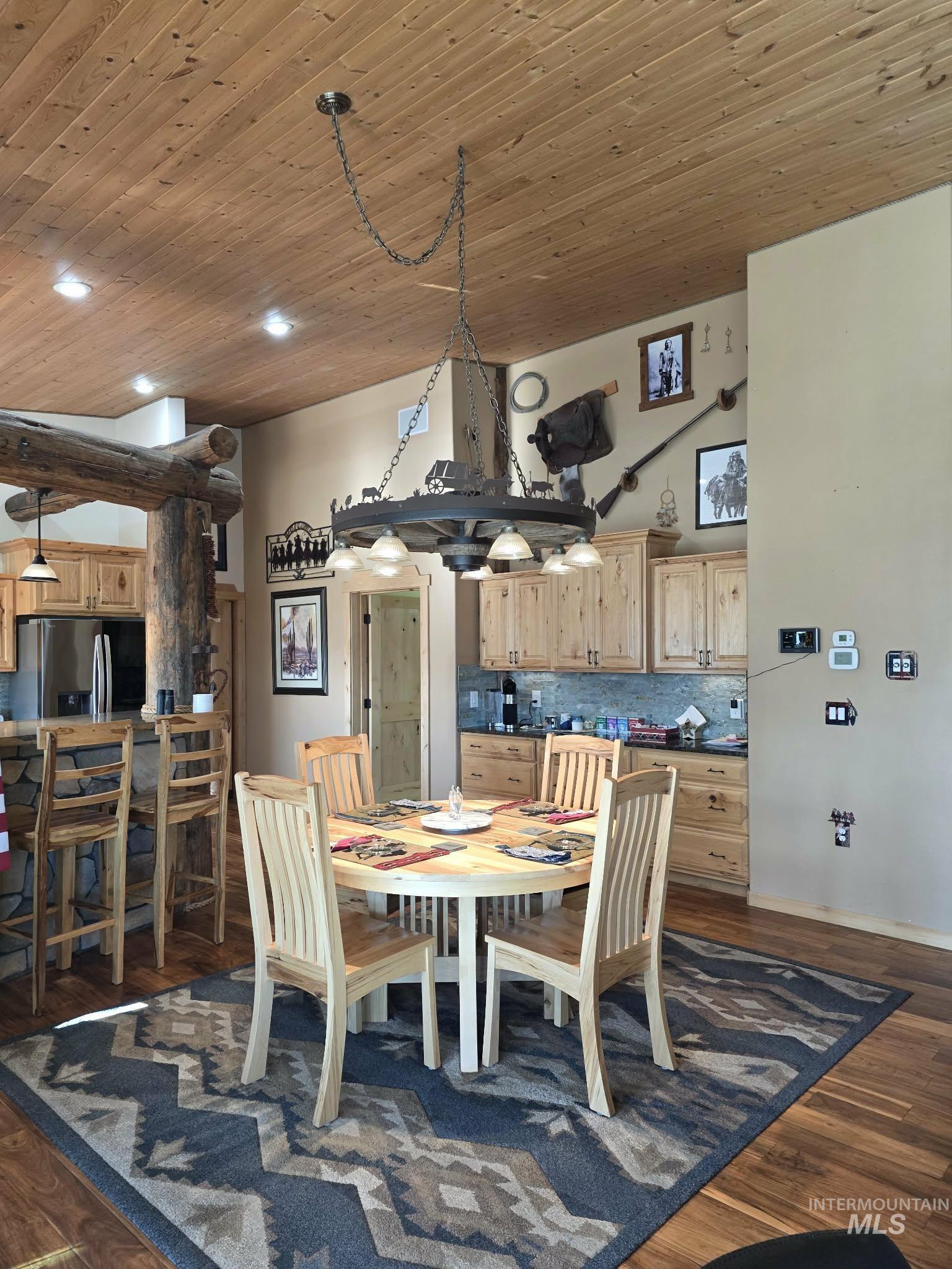 809 River Pointe Lane Lenore, ID 83541 - Photo 13 of 43 Dining space with wood ceiling, dark wood-style floors, and recessed lighting