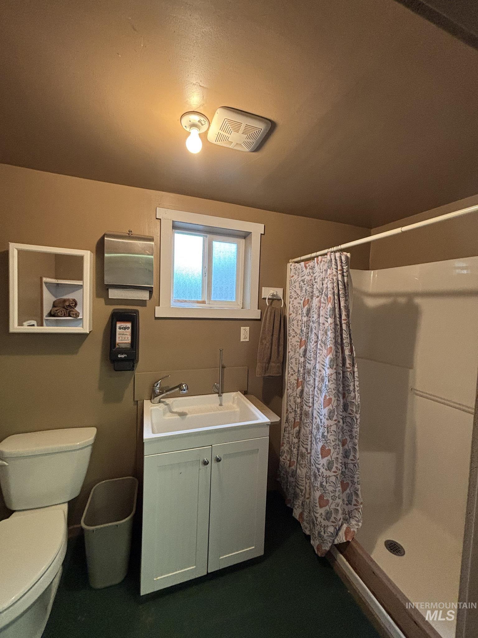 809 River Pointe Lane Lenore, ID 83541 - Photo 14 of 43 Bathroom with vanity and a shower stall