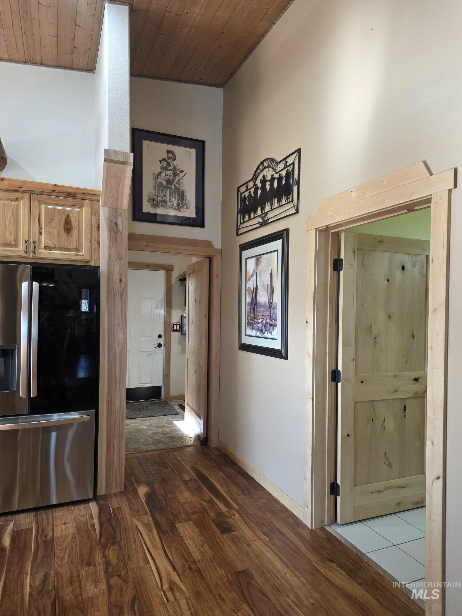 809 River Pointe Lane Lenore, ID 83541 - Photo 17 of 43 Hall featuring dark wood-type flooring and wood ceiling