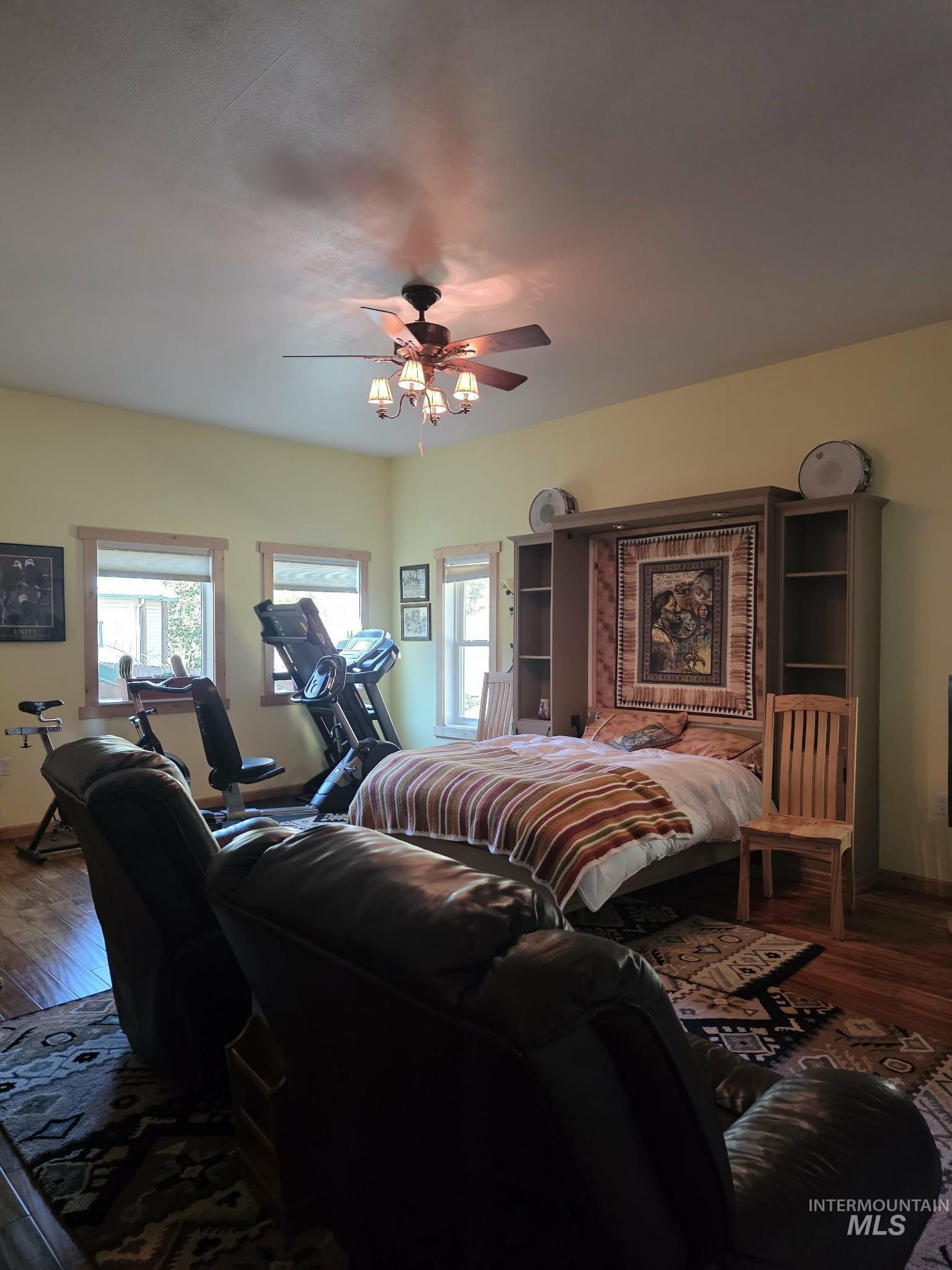 809 River Pointe Lane Lenore, ID 83541 - Photo 30 of 43 Bedroom featuring hardwood / wood-style flooring and a ceiling fan