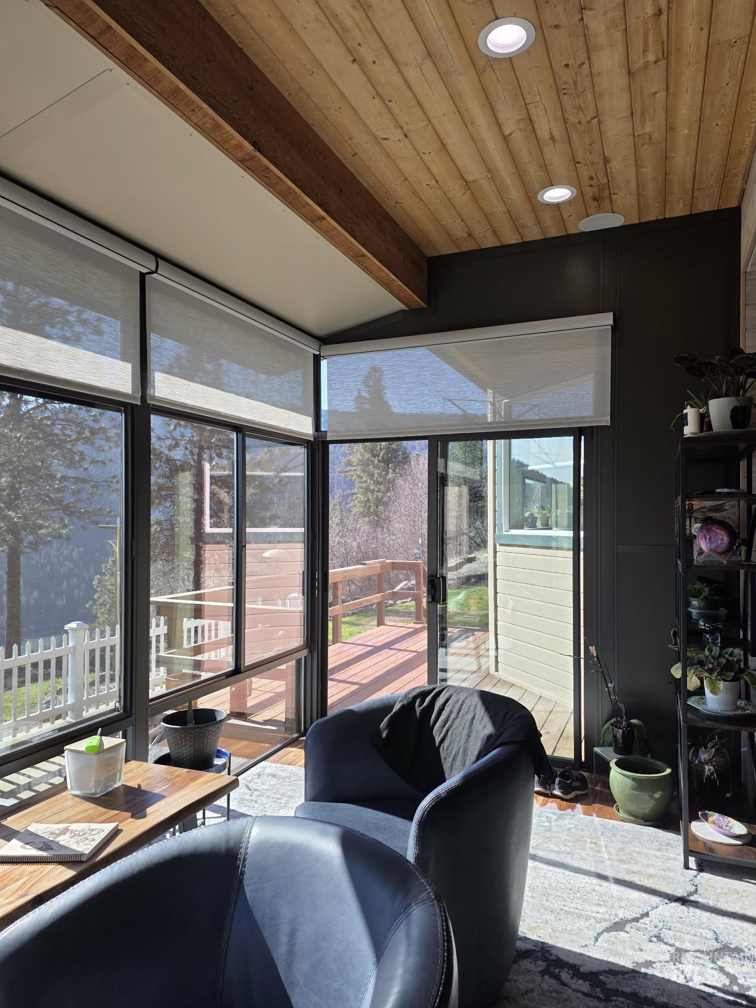 809 River Pointe Lane Lenore, ID 83541 - Photo 8 of 43 Sunroom / solarium featuring recessed lighting, wood ceiling, floor to ceiling windows, and lofted ceiling with beams