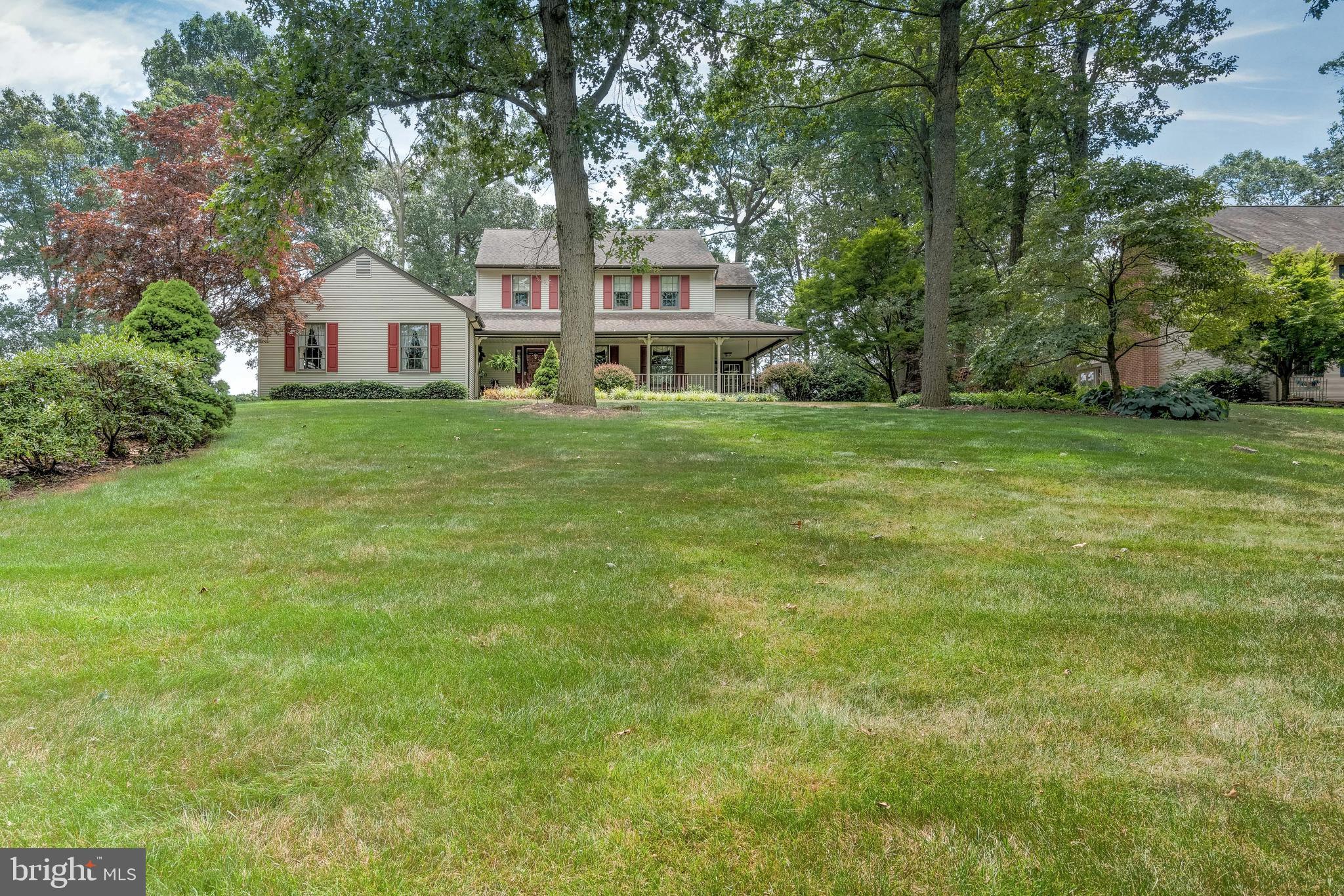 5362 Field Pointe Drive Spring Grove, PA 17362 - Photo 1 of 43 a front view of a house with a garden