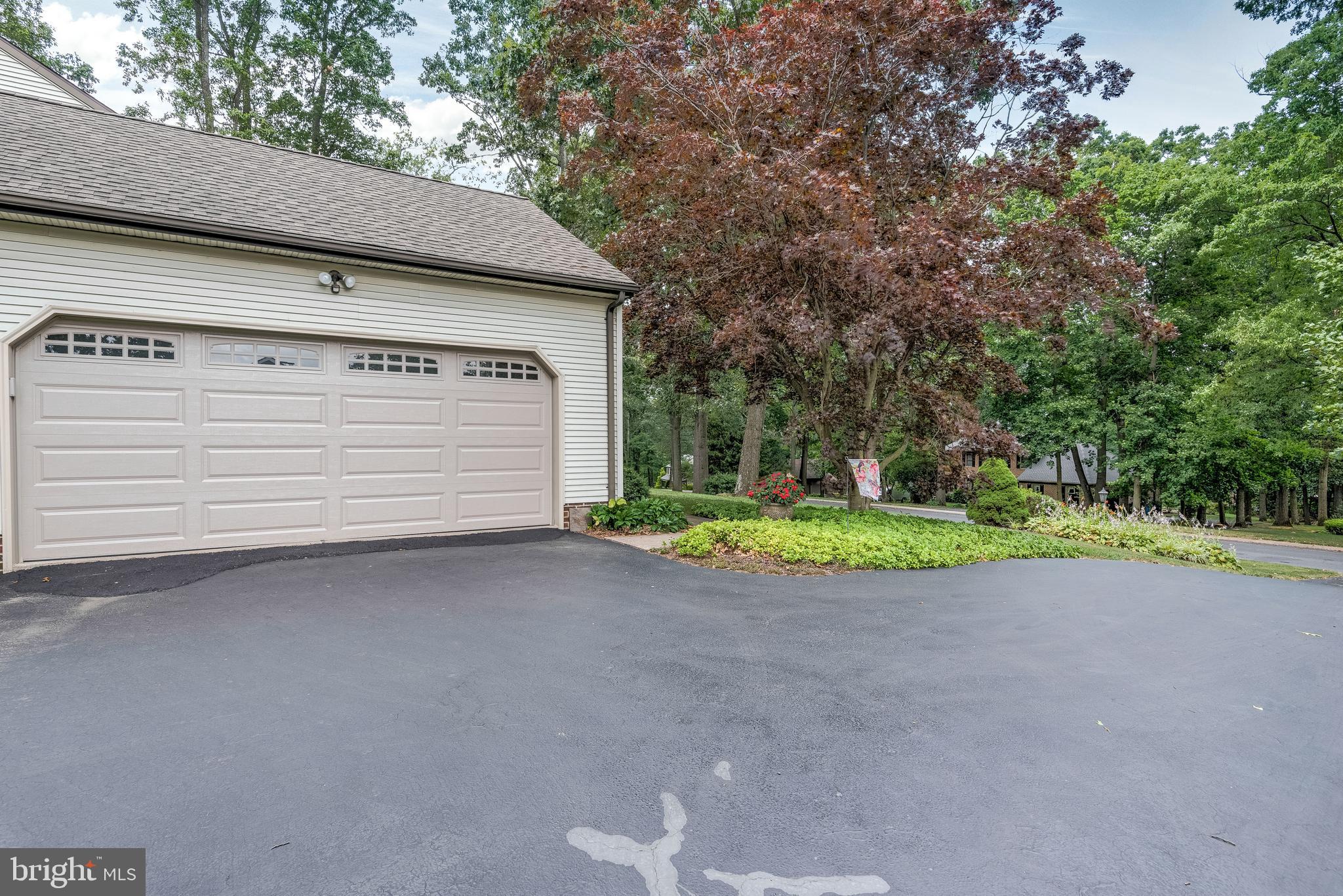 5362 Field Pointe Drive Spring Grove, PA 17362 - Photo 12 of 43 a view of a house with a yard and garage