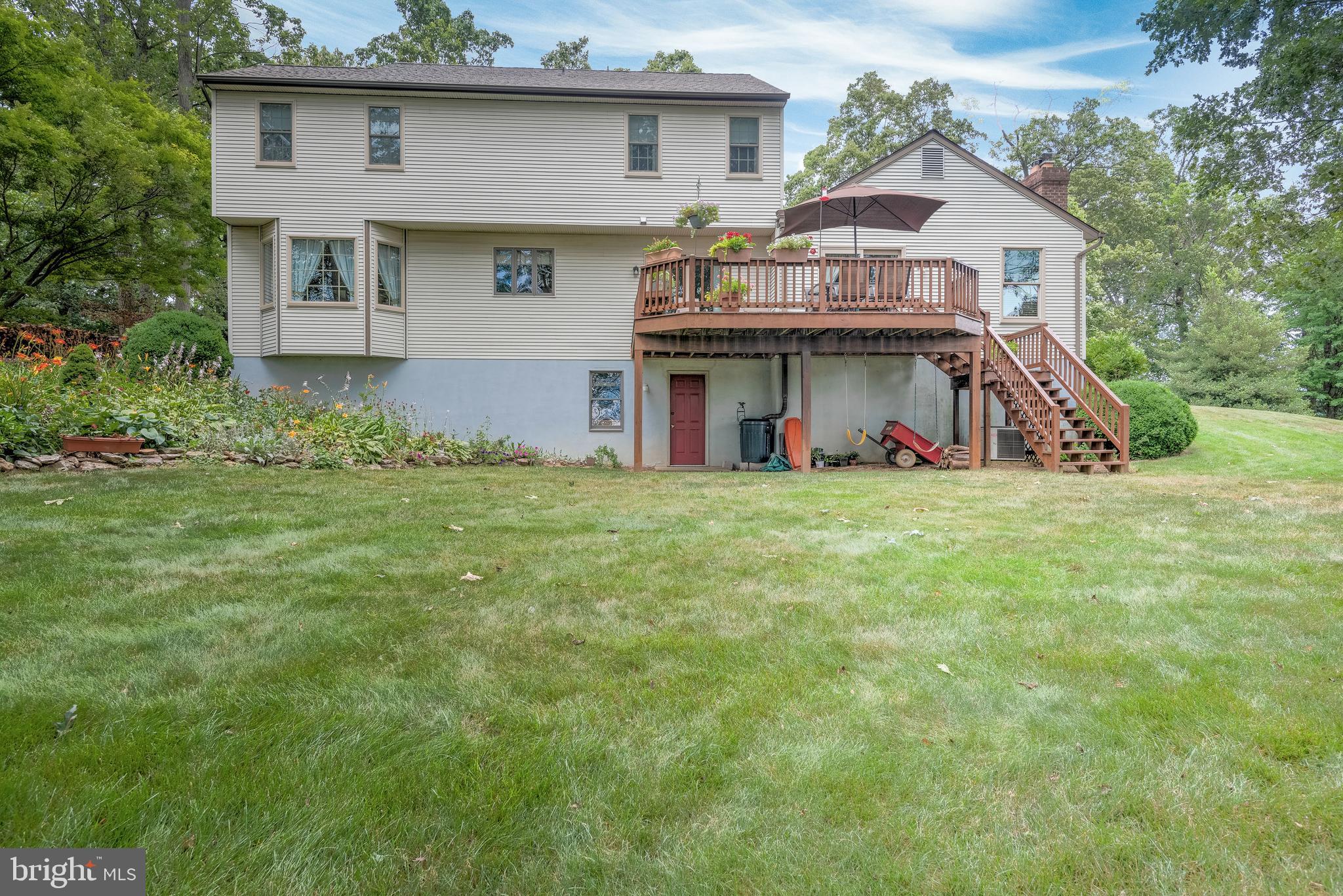 5362 Field Pointe Drive Spring Grove, PA 17362 - Photo 16 of 43 a view of a house with a big yard and large trees
