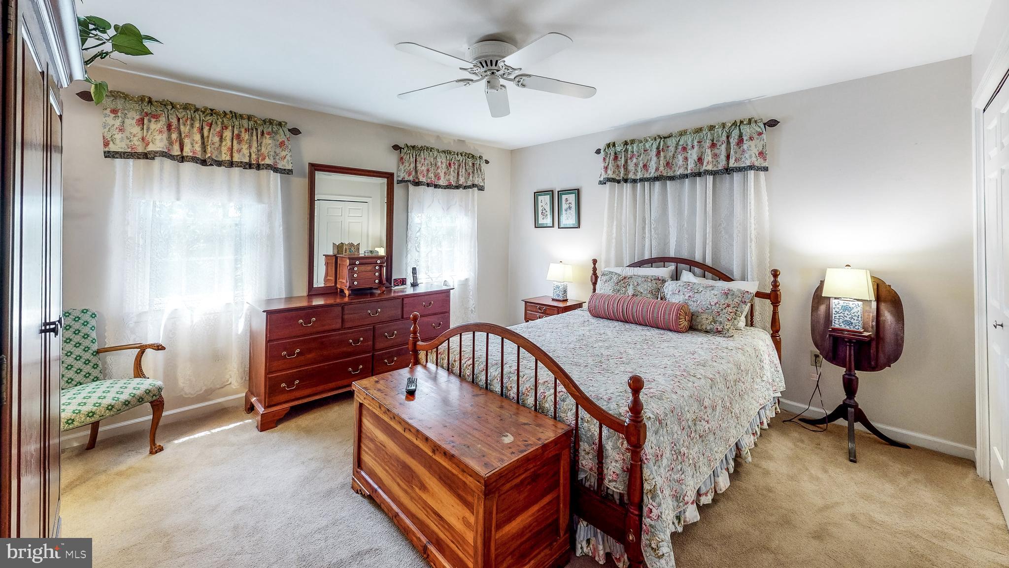5362 Field Pointe Drive Spring Grove, PA 17362 - Photo 27 of 43 a bedroom with a bed and a chandelier