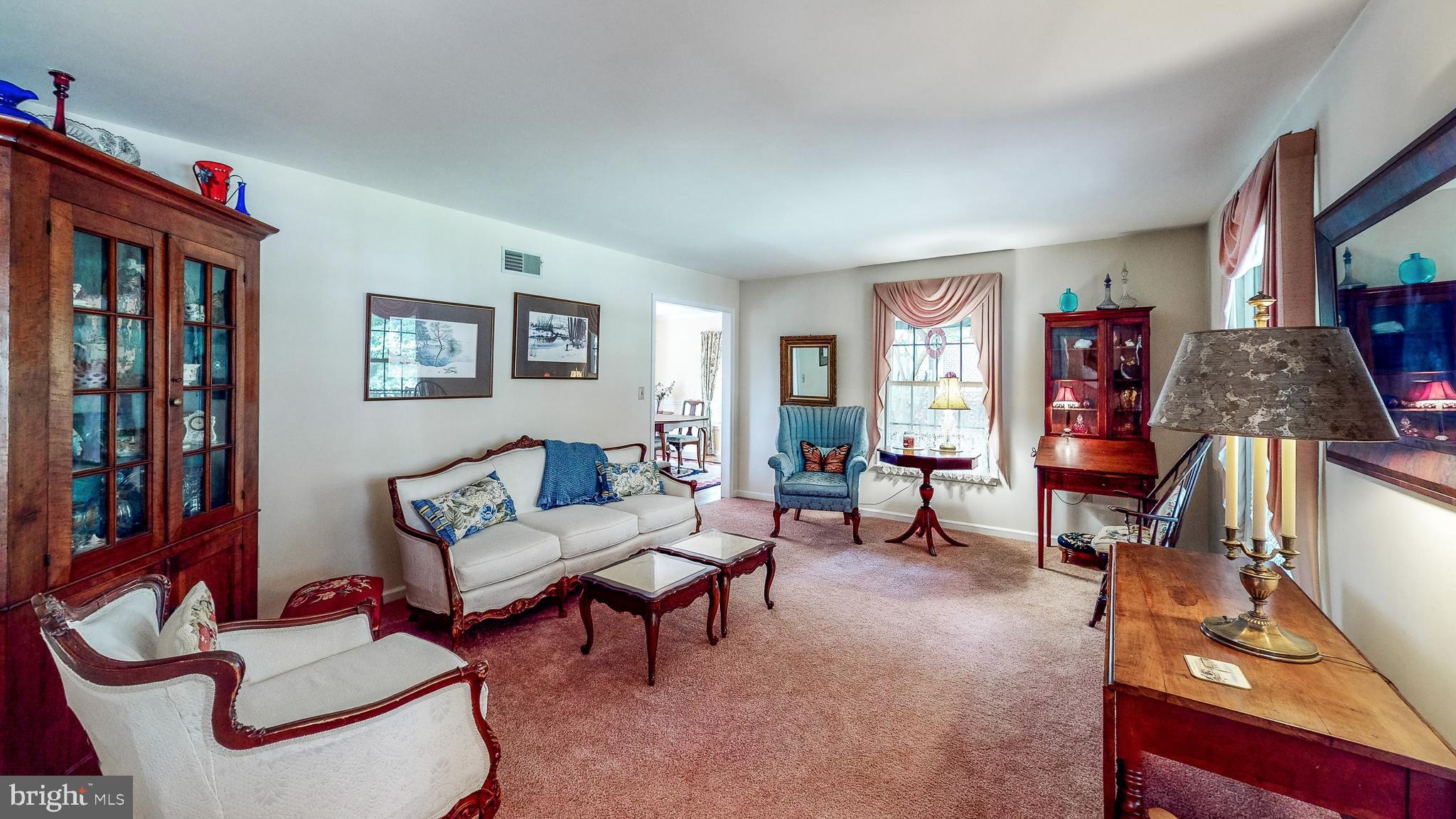 5362 Field Pointe Drive Spring Grove, PA 17362 - Photo 30 of 43 a living room with furniture a bookshelf and a window