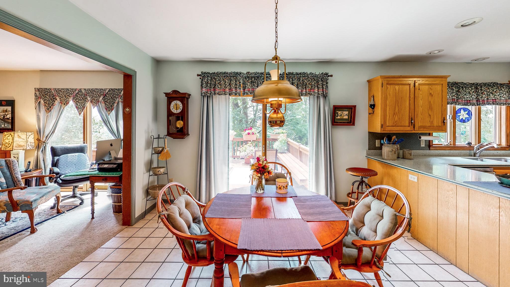 5362 Field Pointe Drive Spring Grove, PA 17362 - Photo 40 of 43 a dining room with furniture a chandelier and window
