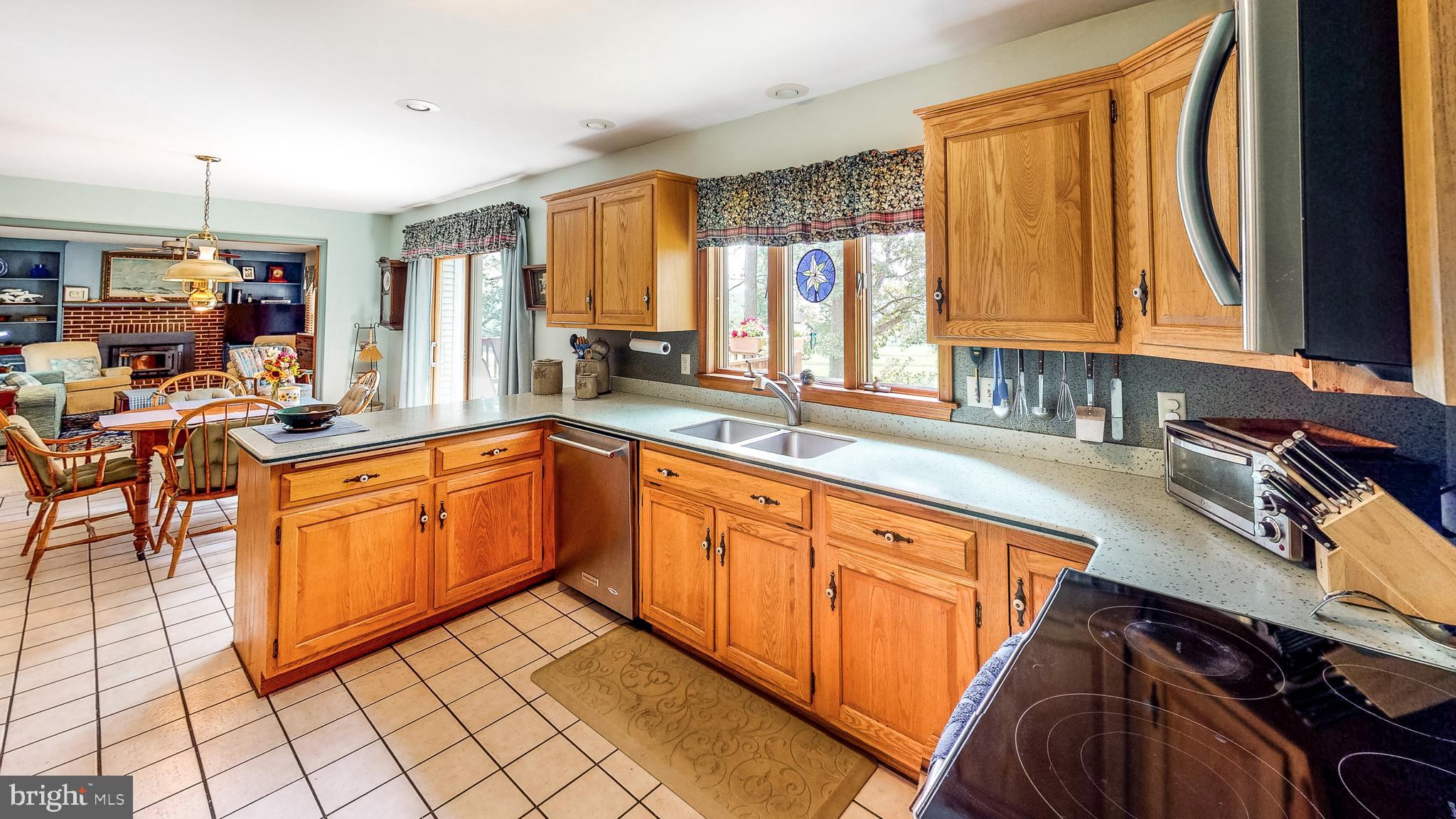 5362 Field Pointe Drive Spring Grove, PA 17362 - Photo 42 of 43 a kitchen with stainless steel appliances granite countertop a sink and cabinets