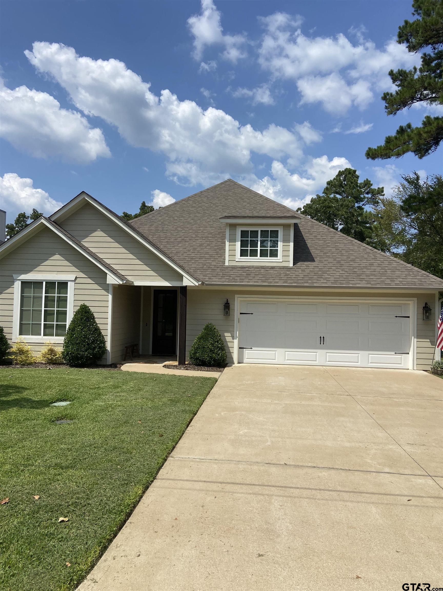 16864 Easy Street Flint, TX 75762 - Photo 2 of 34 a front view of a house with a yard