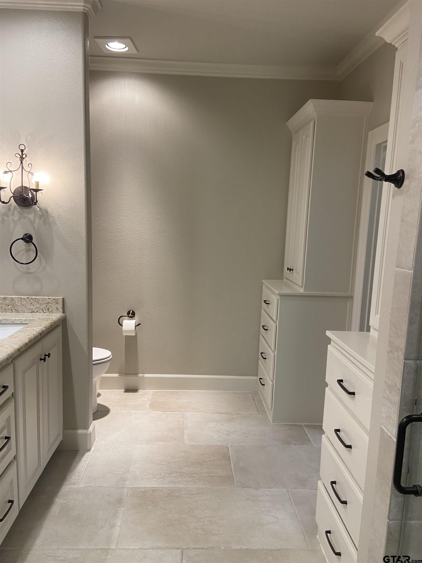 16864 Easy Street Flint, TX 75762 - Photo 24 of 34 view of bathroom with a sink and mirror