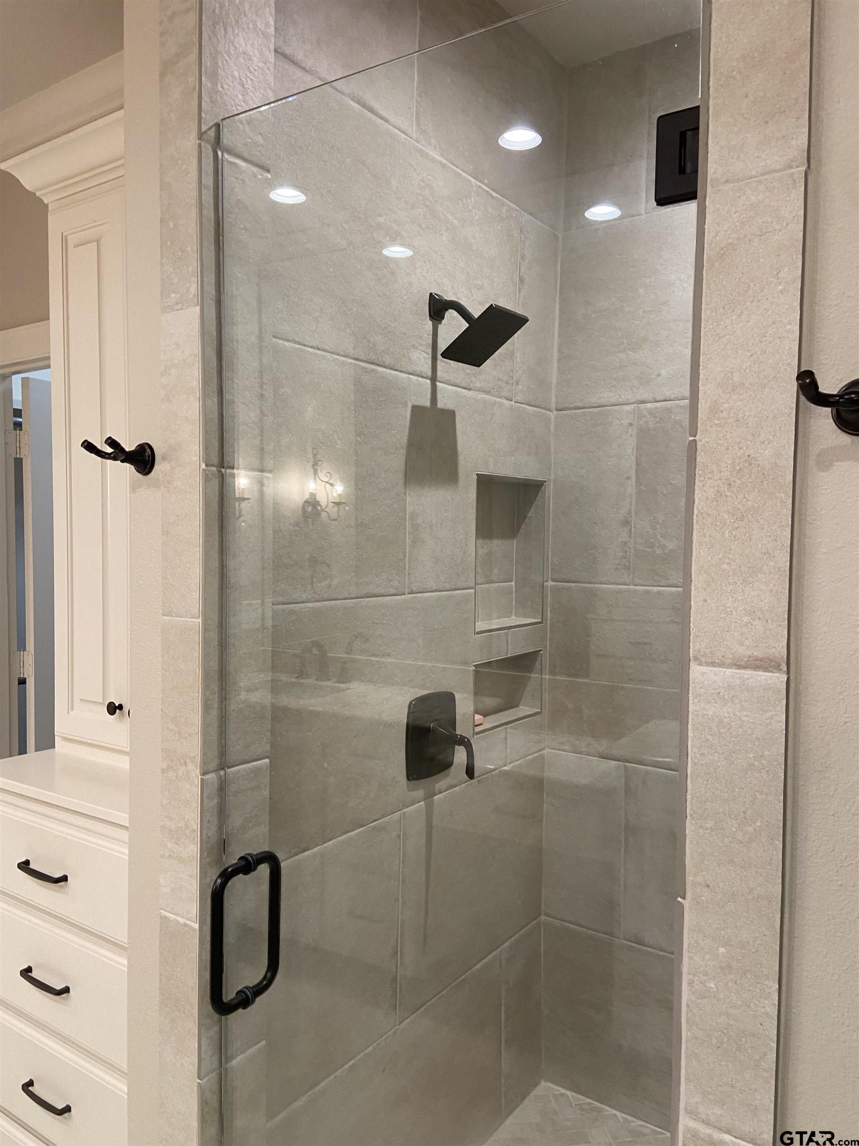 16864 Easy Street Flint, TX 75762 - Photo 25 of 34 a bathroom with a shower