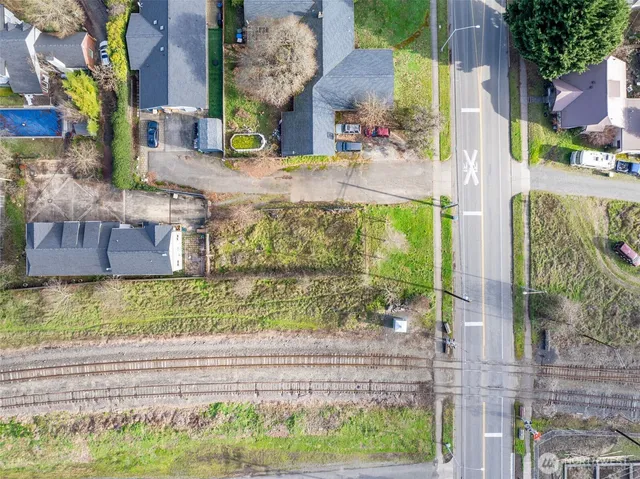 a view of entrance gate of the house and front view of a house