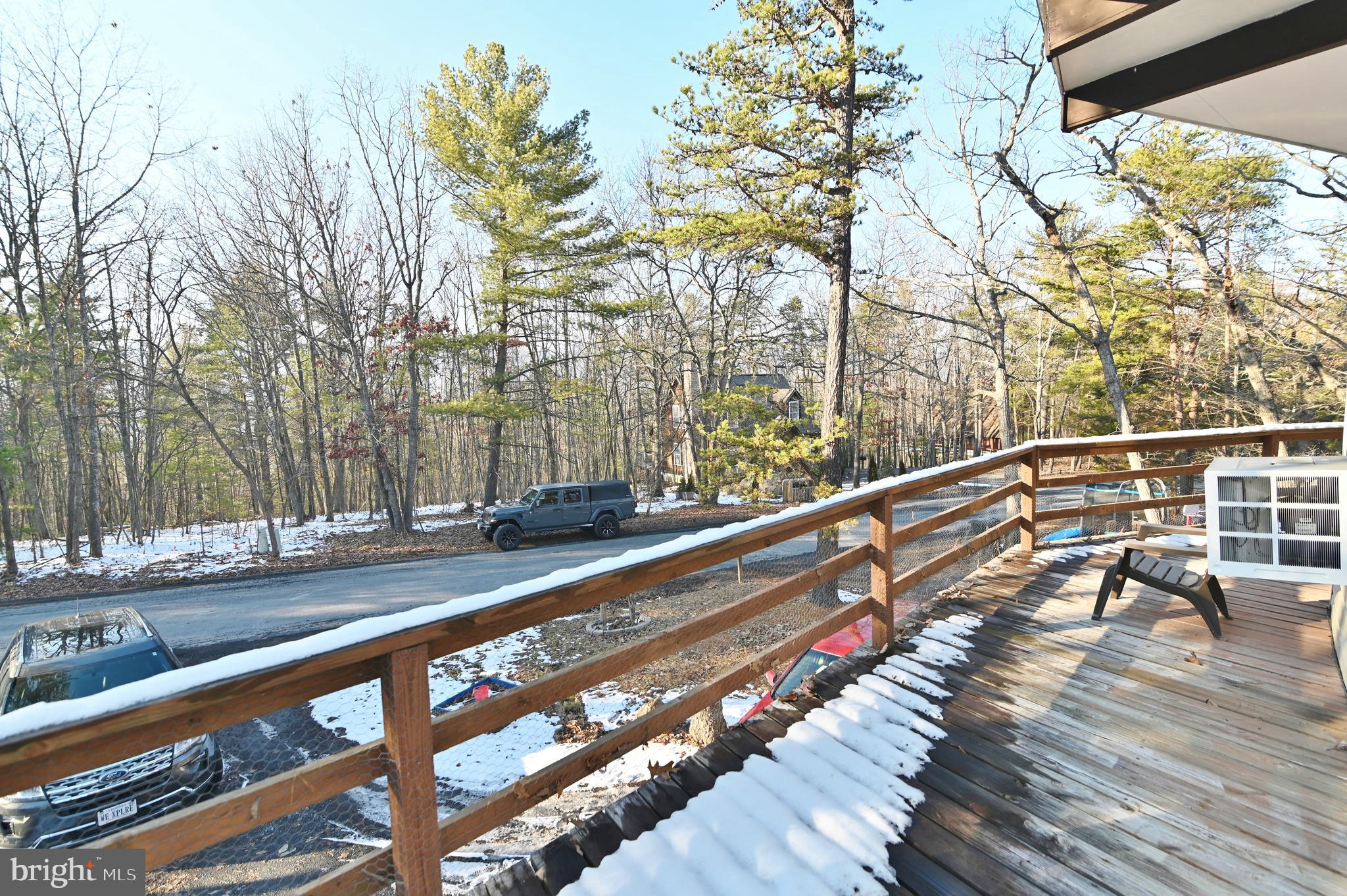 8148 Supinlick Ridge Road Mount Jackson, VA 22842 - Photo 29 of 39 a view of balcony with wooden floor and fence